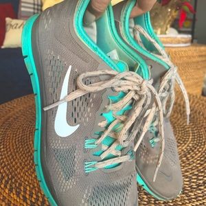 NIKE teal and grey sneakers